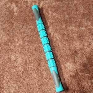 Turquoise and Gray Muscle Roller Stick